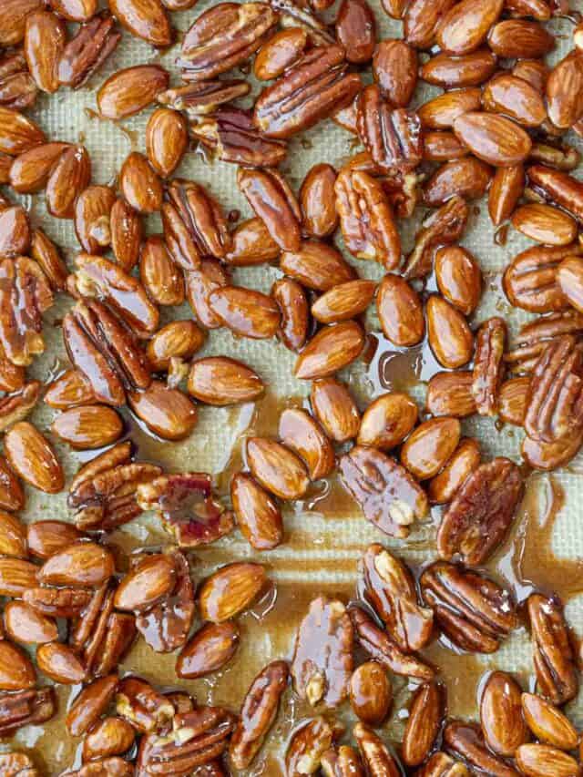 Candied pecans and almonds on a silpat.