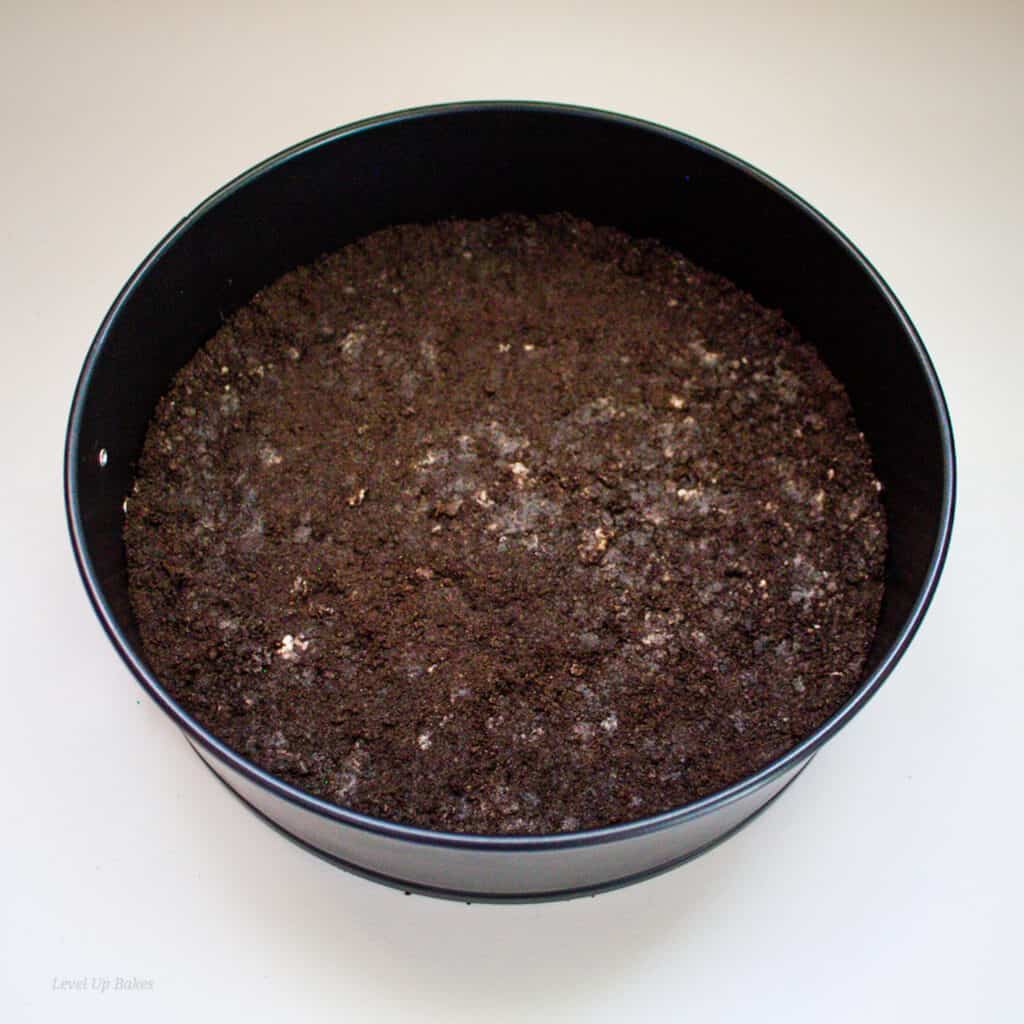 oreo crust pressed into bottom of 9 inch pan