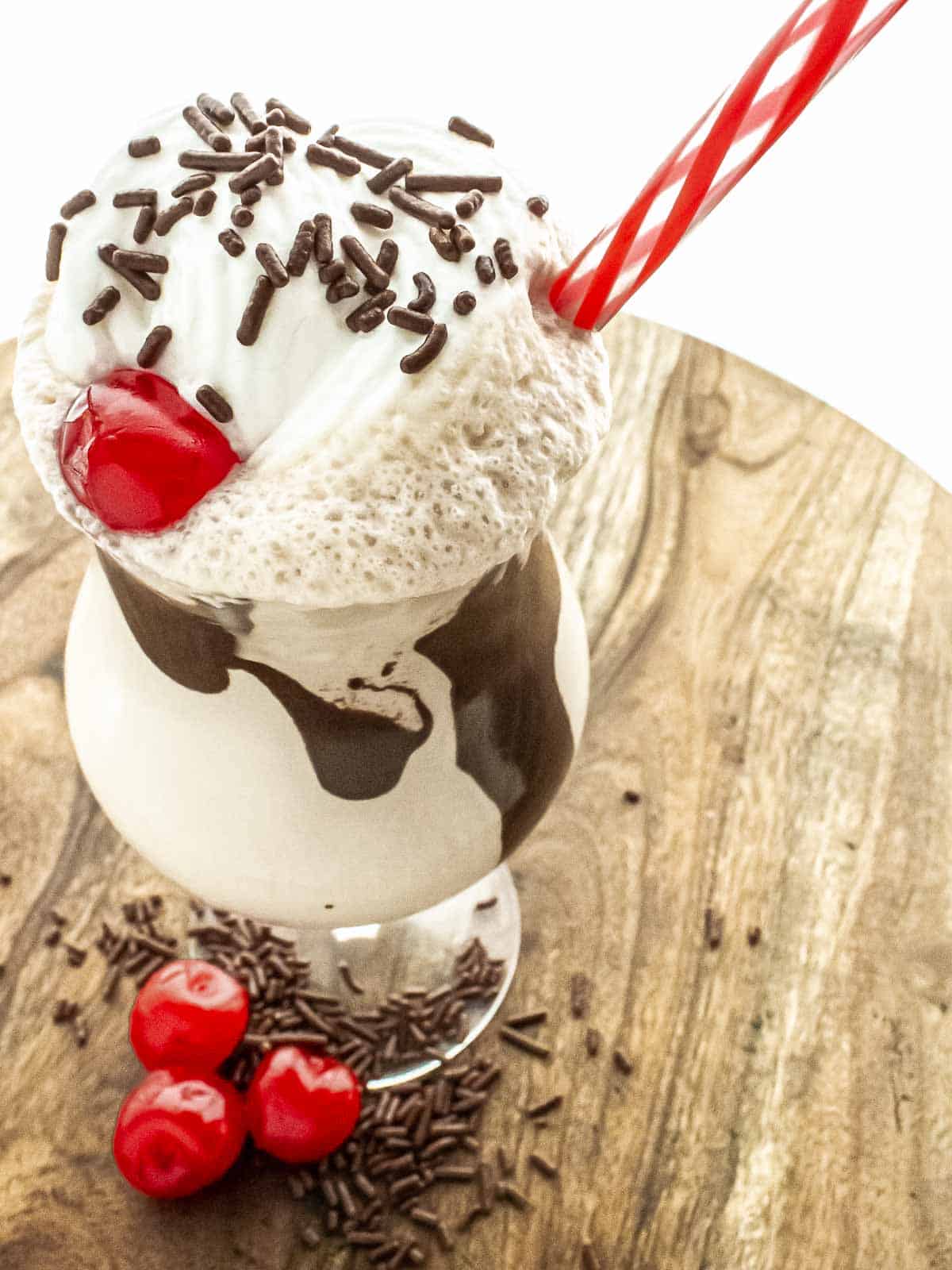 mudslide with sprinkles, cherry and a red striped straw