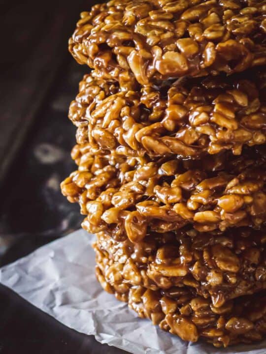 close up of a stack of star crunch cookies