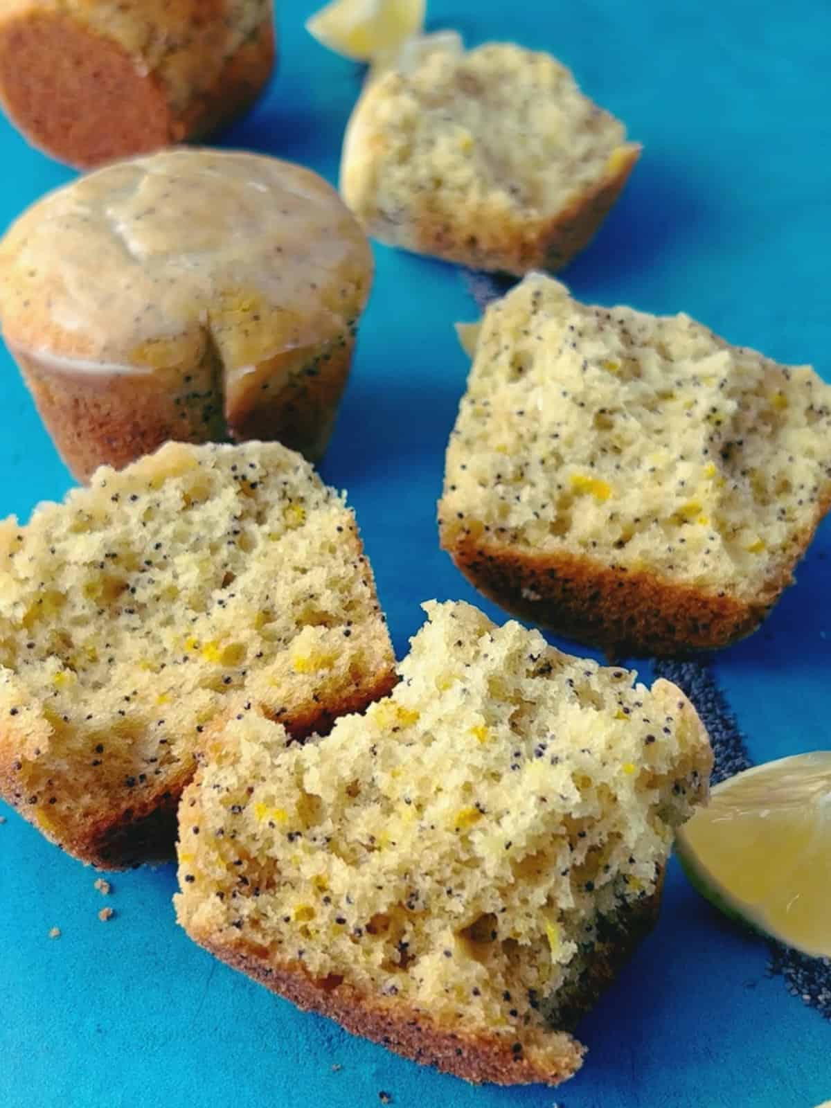 fresh baked muffins with a bite taken out of one.