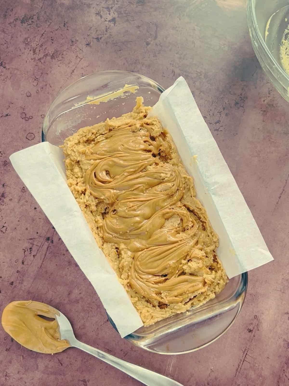 warmed peanut butter is swirled on top of the bread batter before baking.