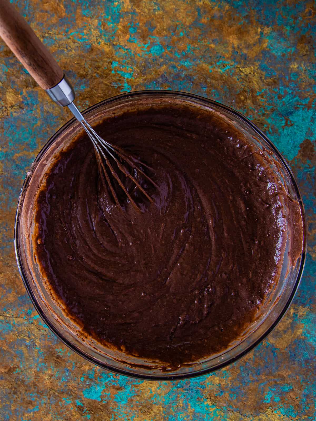 chocolate cake batter mixed in a bowl.