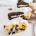 cookies and cream cookies topped with oreos.