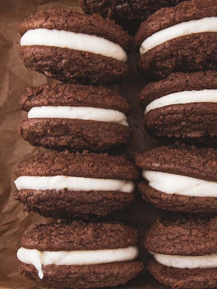 A group of brownie mix cookies with cream cheese frosting.